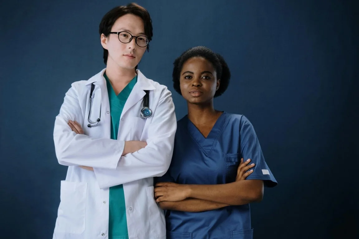 Two healthcare professionals standing together
